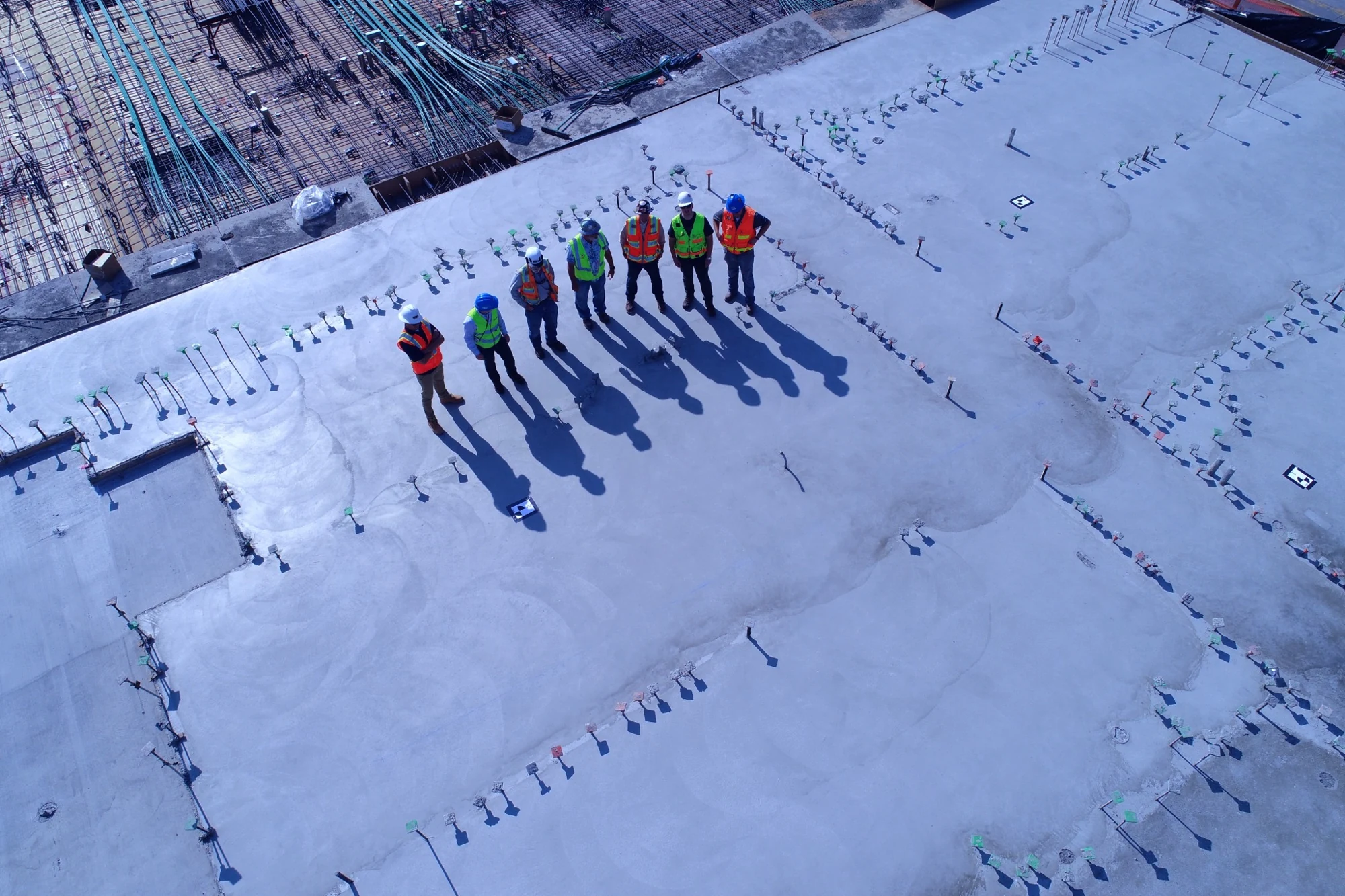 Construction professionals reviewing site work